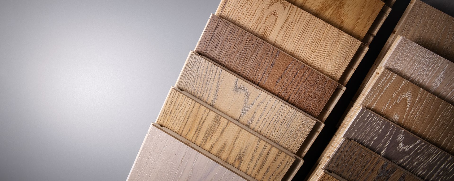 Oak parquet flooring samples showcasing premium styles at a trusted hardwood flooring store.