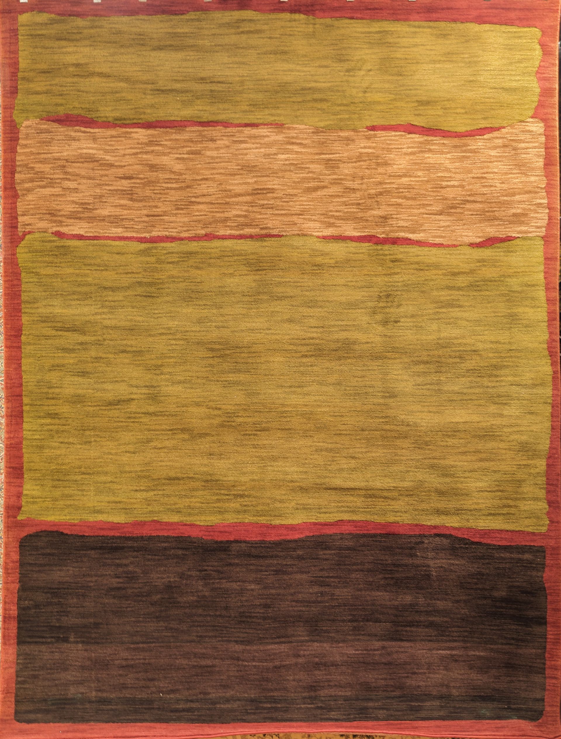 Abstract woven rug with horizontal bands of tan, gold, and dark brown on a red border