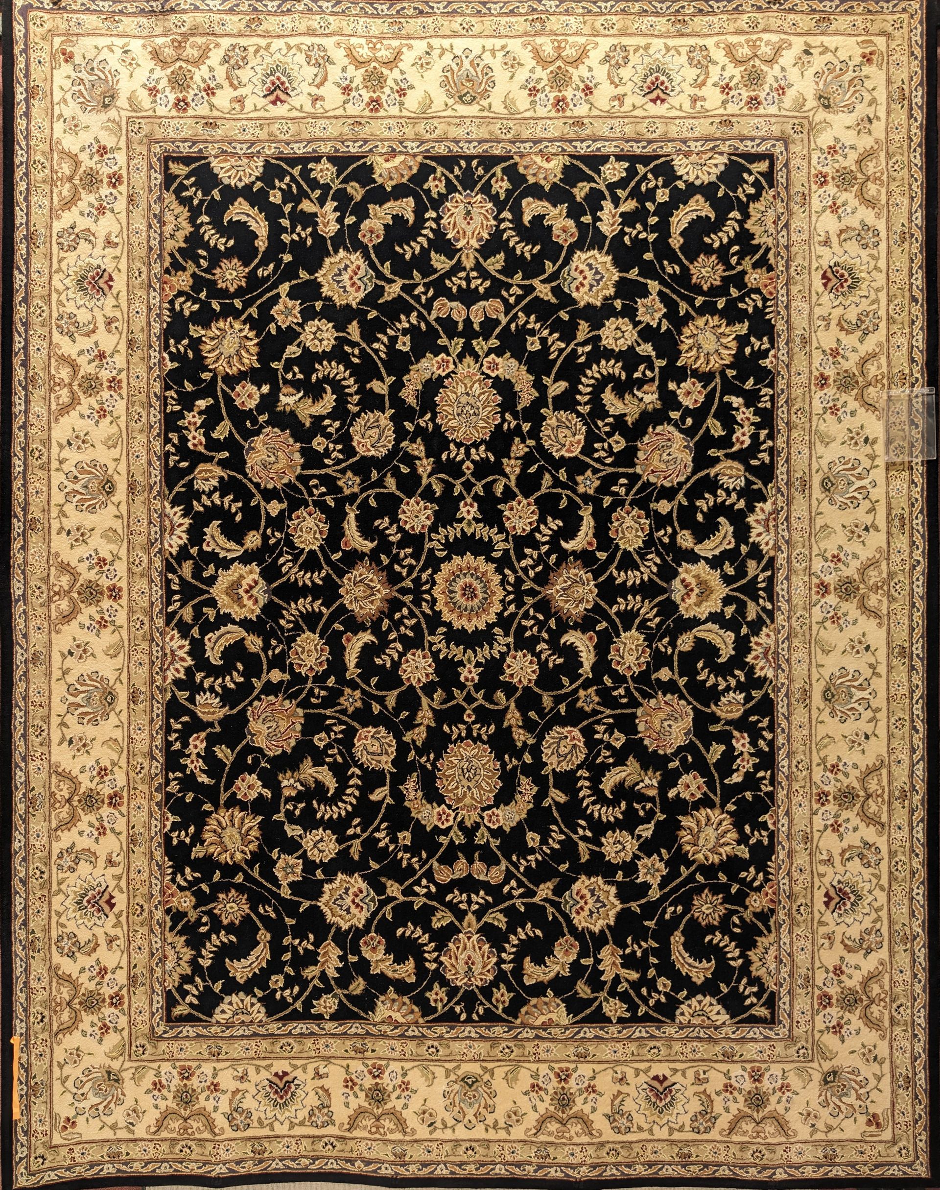 Beige and black floral oriental rug with ornate border pattern