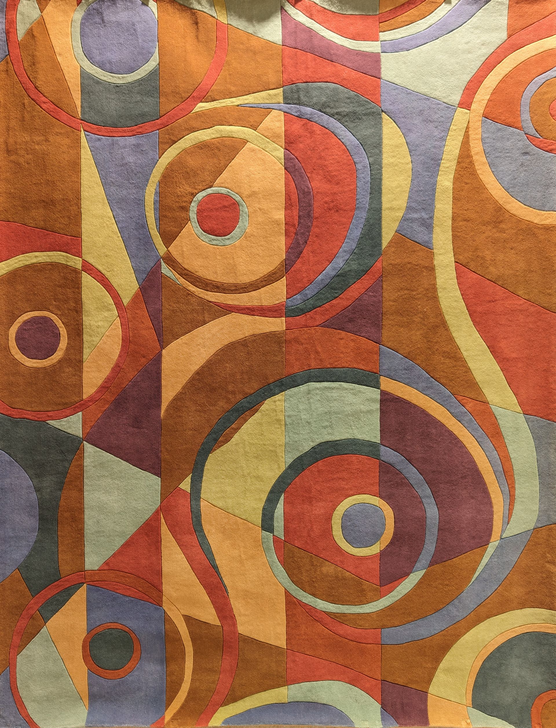 Abstract geometric pattern with swirling circles and curved lines in red, orange, blue, and green.