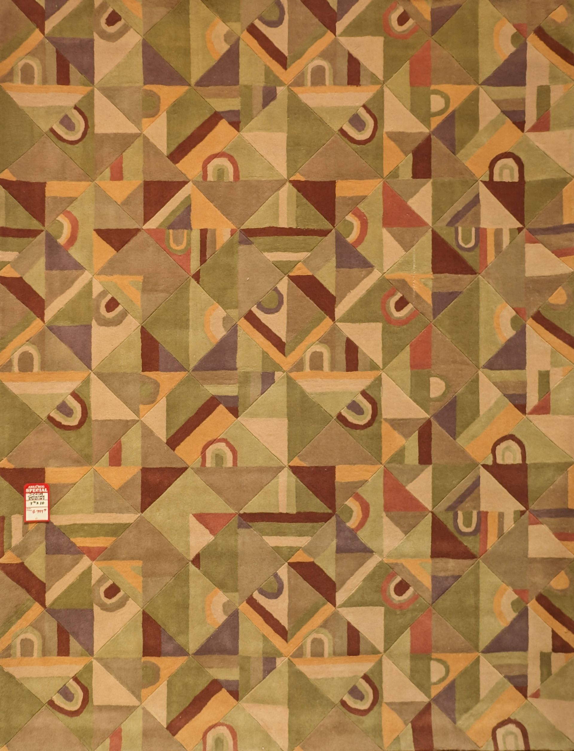 Abstract geometric quilt pattern in muted tan, brown, and orange tones