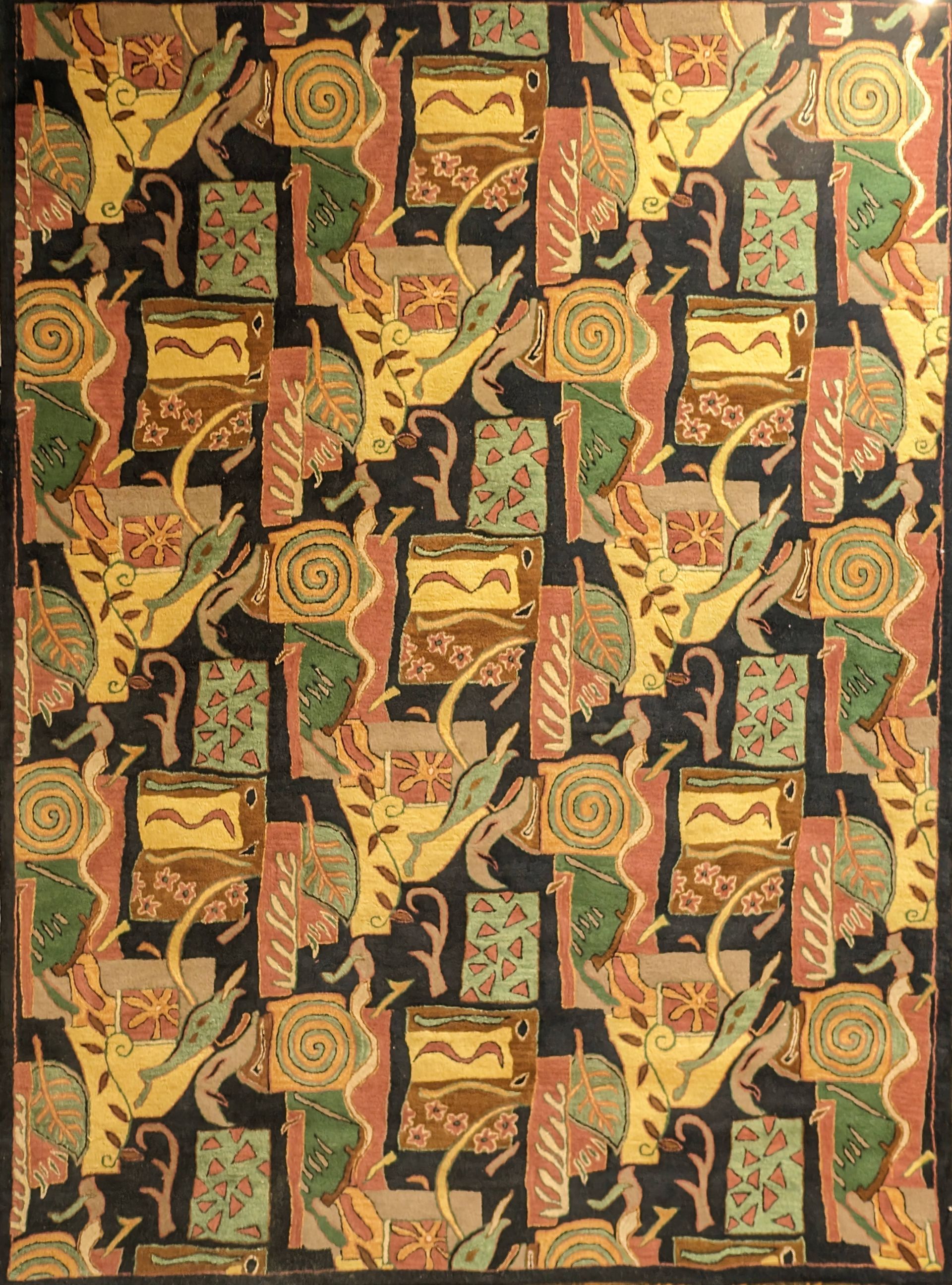 Colorful vintage patterned fabric with gold, green, red, and black geometric floral motifs