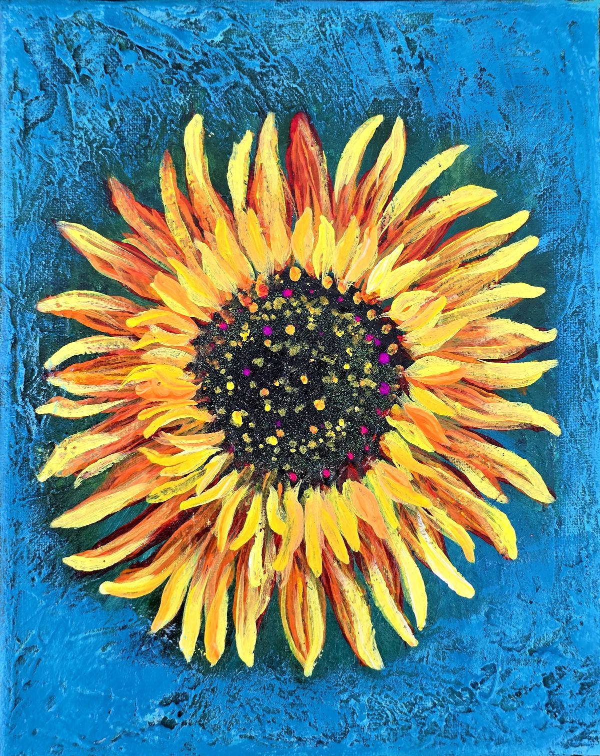 Sunflower with yellow-orange petals and a dark center on a textured blue background