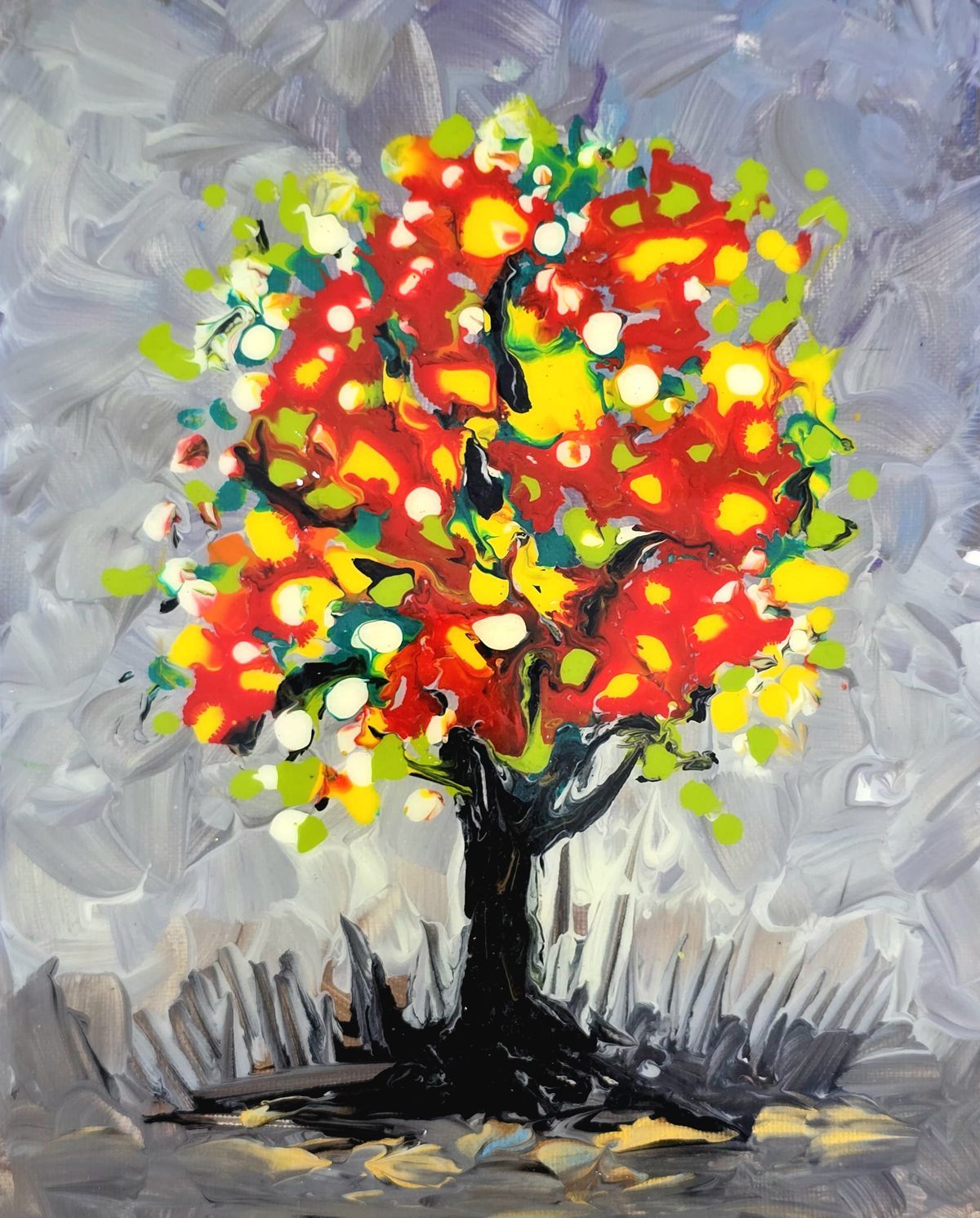Colorful abstract tree with red, yellow, and green leaves against a gray background.