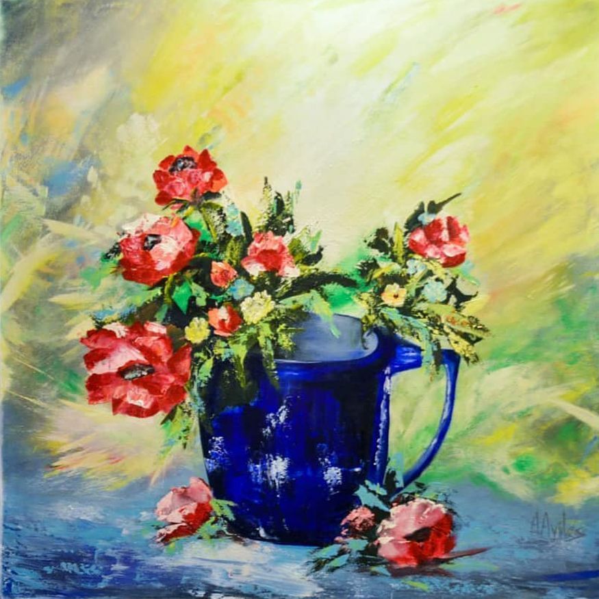 Blue pitcher of red flowers on a yellow-green abstract background