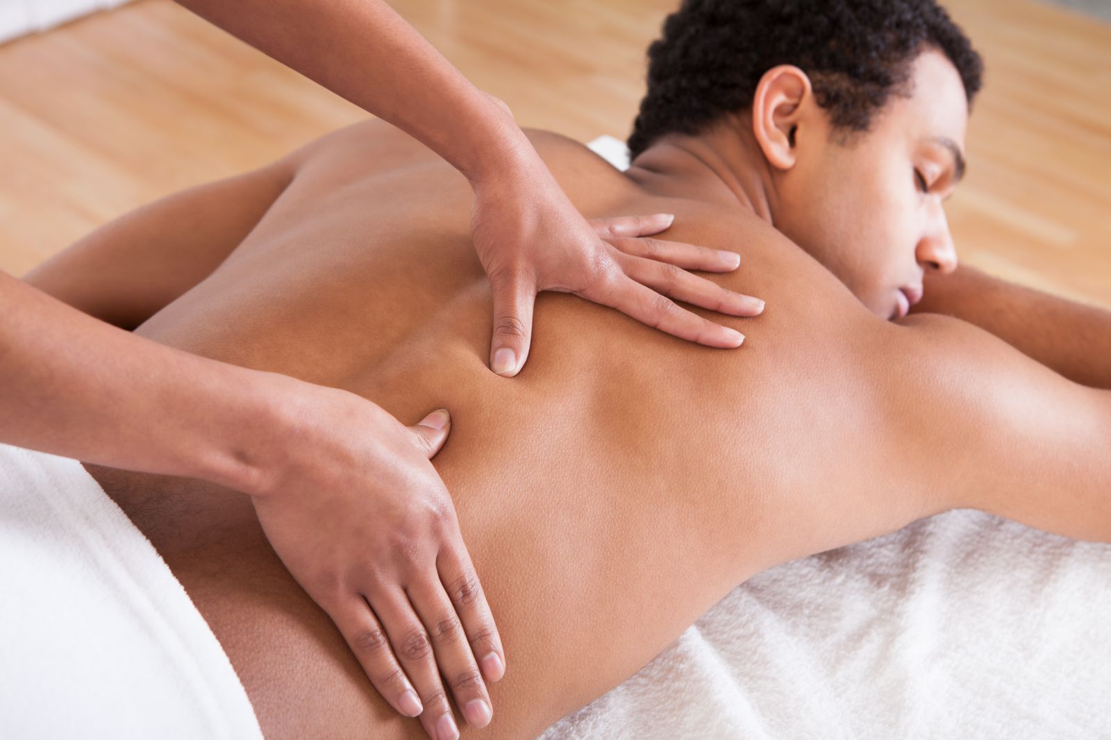 A man is getting a massage at a spa in Lanzarote.