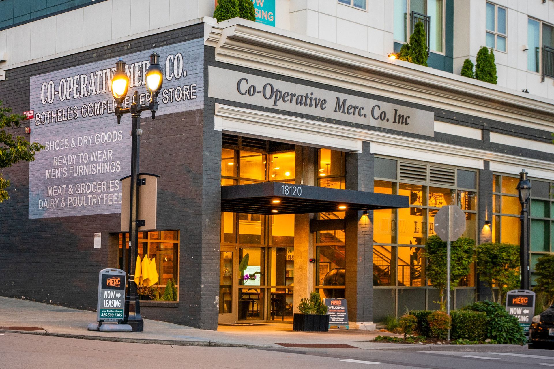 A building with a sign that says co-operative mills co. inc.
