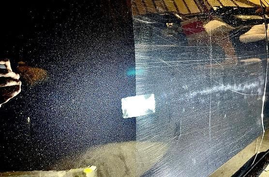 Black Paint Showing Scratches and Swirls