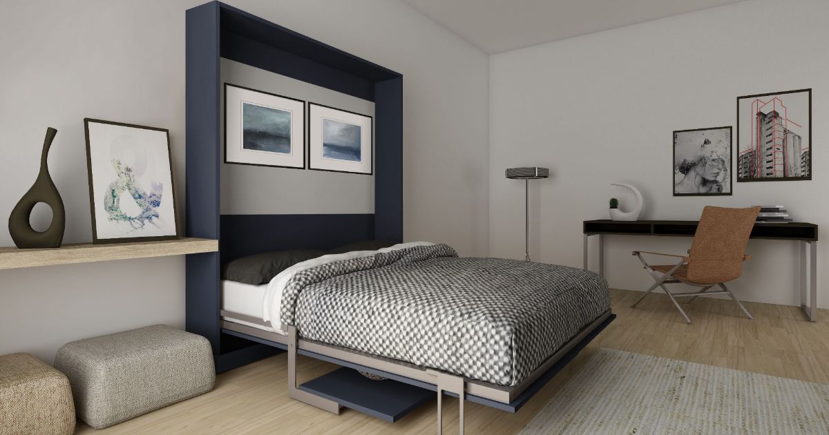 A bedroom with a bed that is pulled out of the wall.
