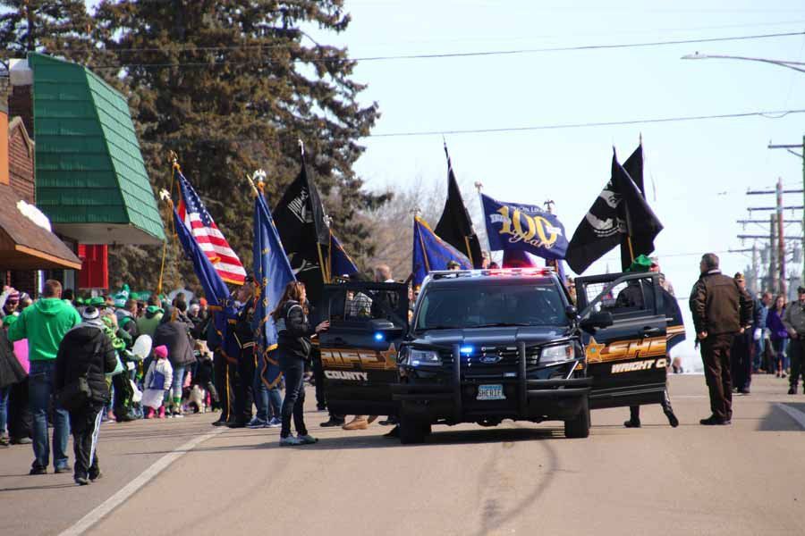 Members Holding Flags — Maple Lake, MN — Maple Lake Chamber of Commerce