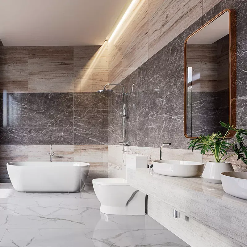 A bathroom with a bathtub , toilet , sink and mirror.