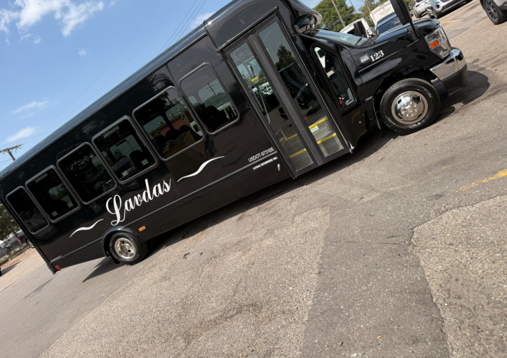 The inside of a bus with a lot of seats