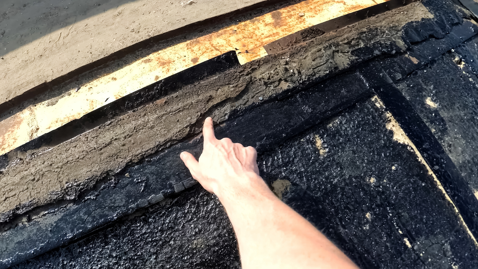 Basement waterproofing installation with interior drainage system setup