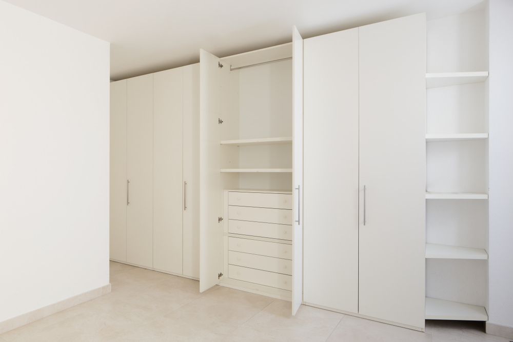 Empty Room With White Cabinets and Shelves — Ken Willis Joinery Pty Ltd In South Grafton, NSW