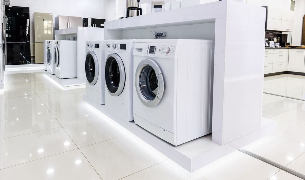 Row of Washing Machines Are Lined Up in a Store — Ken Willis Joinery Pty Ltd In South Grafton, NSW