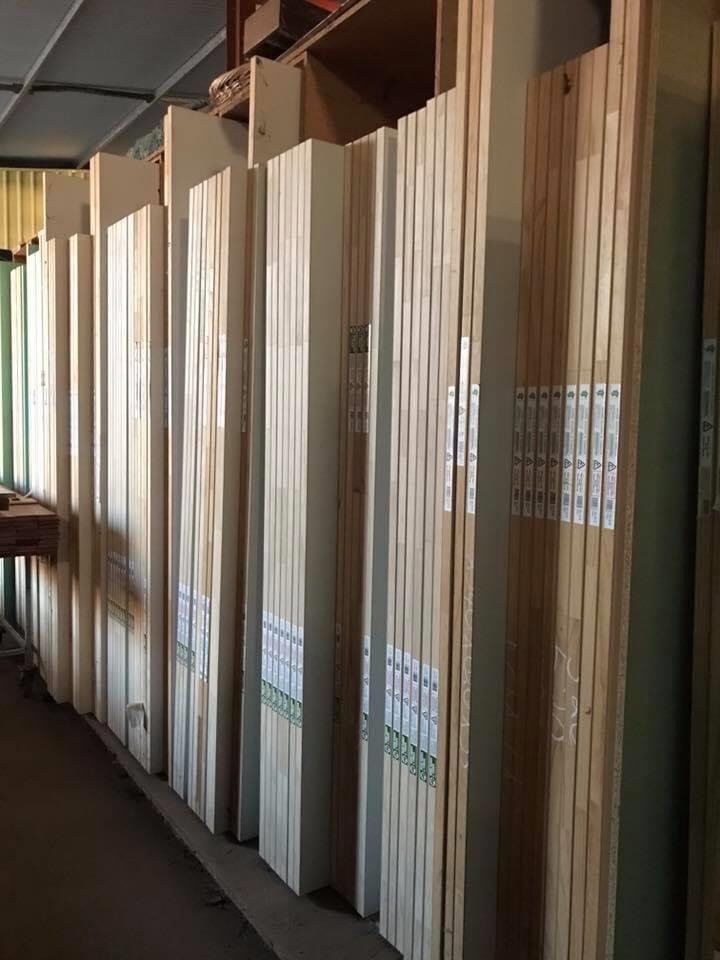 Row of Wooden Boards Sitting on Top of Each Other in a Room — Ken Willis Joinery Pty Ltd In South Grafton, NSW
