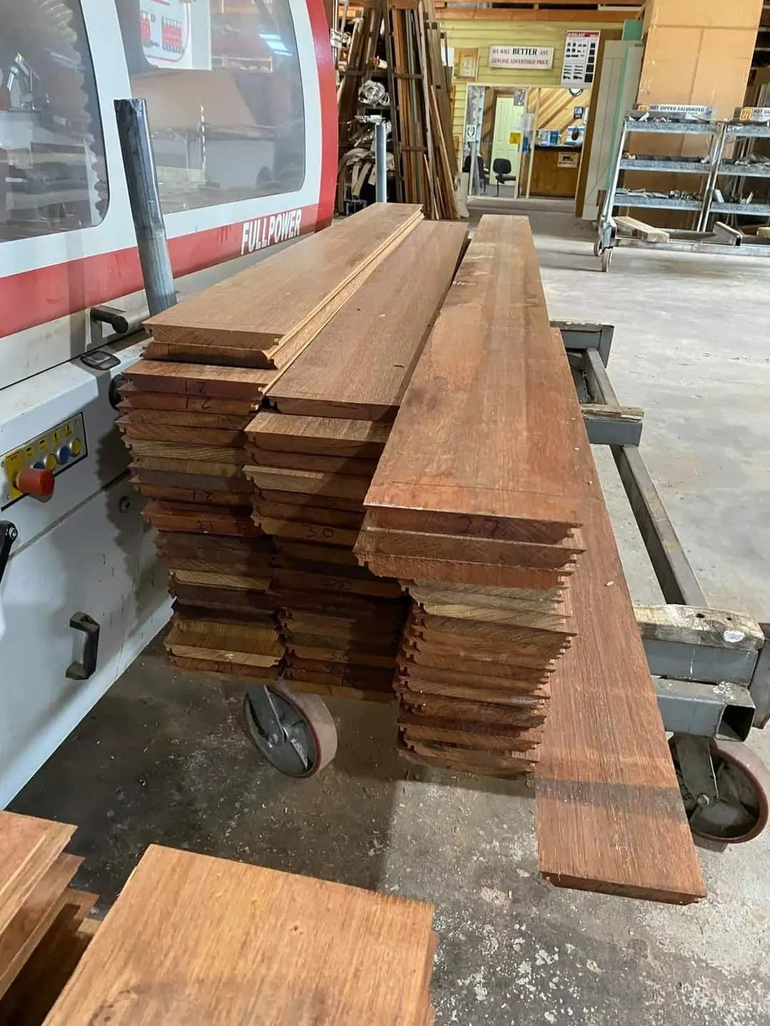Stack of Wood Sitting on Top of a Machine in a Factory — Ken Willis Joinery Pty Ltd In South Grafton, NSW