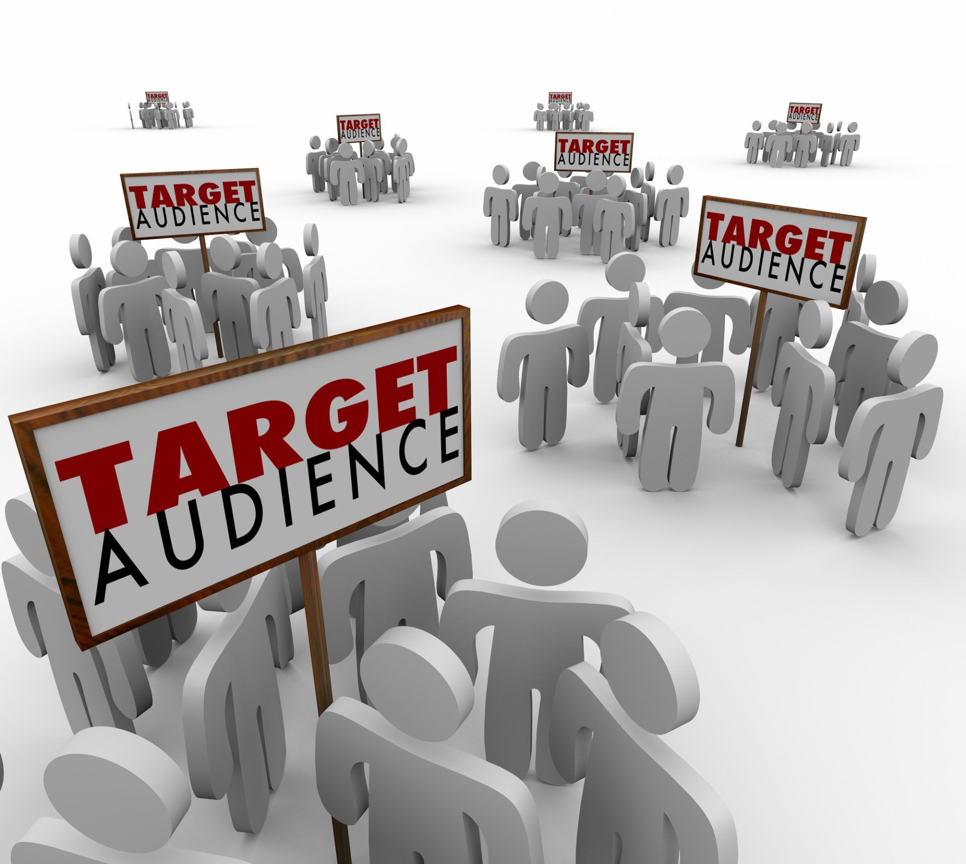 A group of people holding signs that say target audience