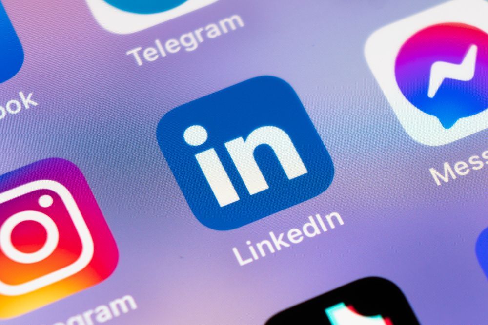 A close up of the linkedin app on a phone