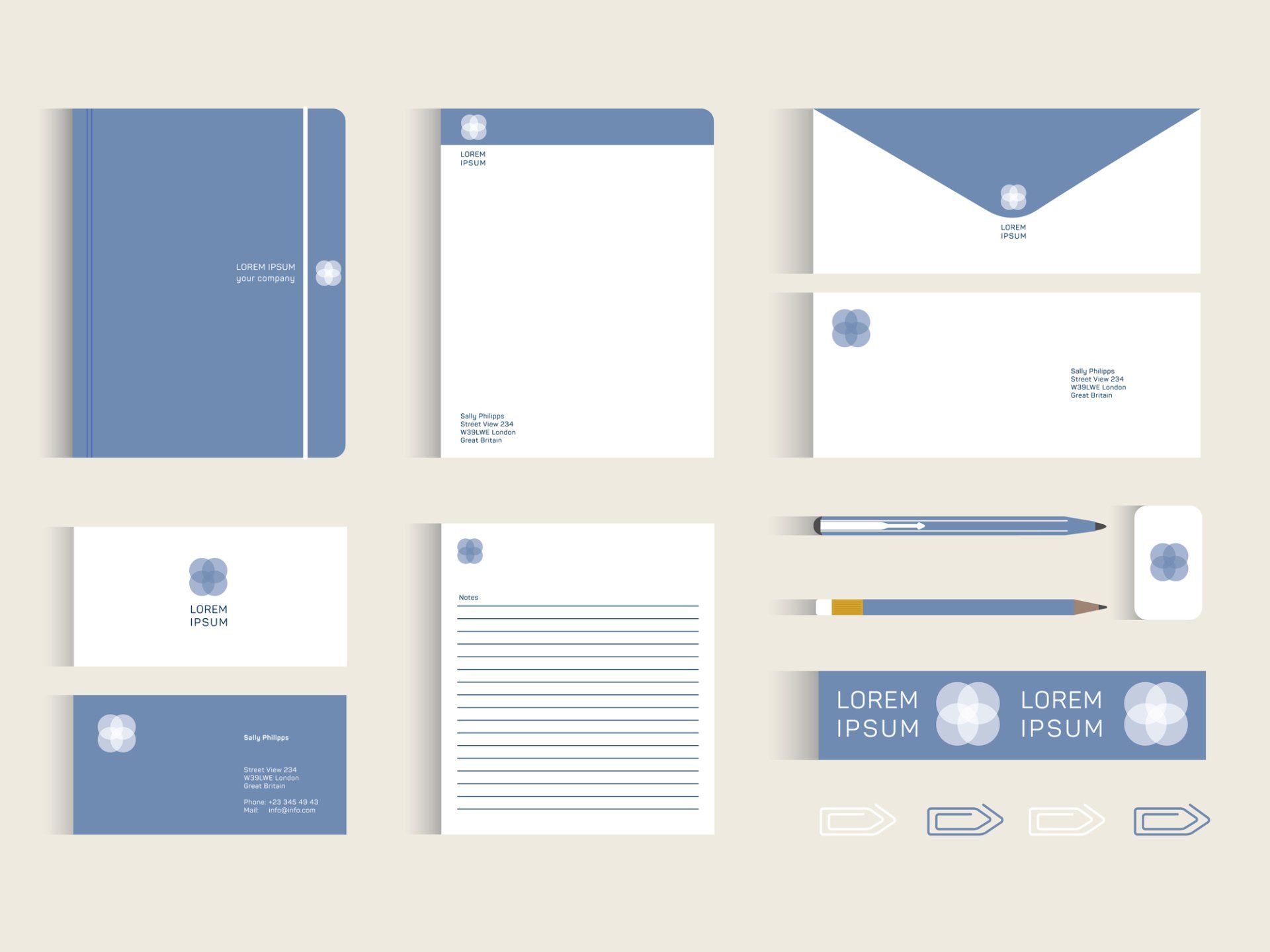 A set of blue and white business cards envelopes and papers