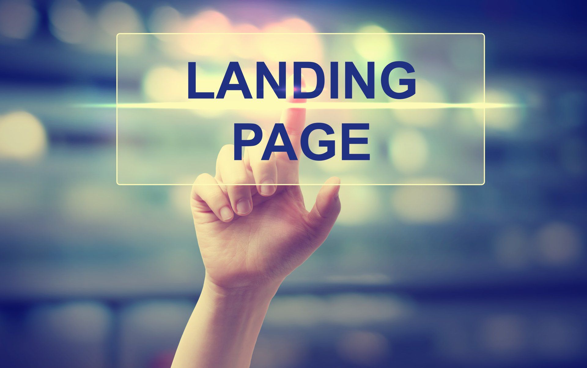 A hand is pressing a button that says landing page