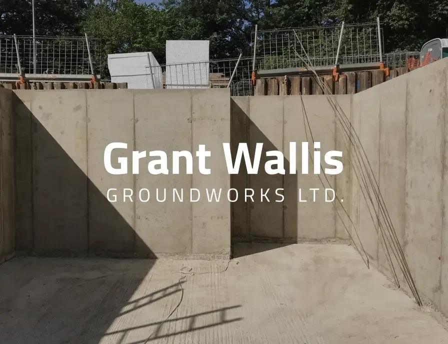 The logo for grant wallis groundworks ltd. is shown