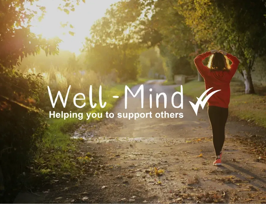 A woman is walking down a path with the words well-mind helping you to support others