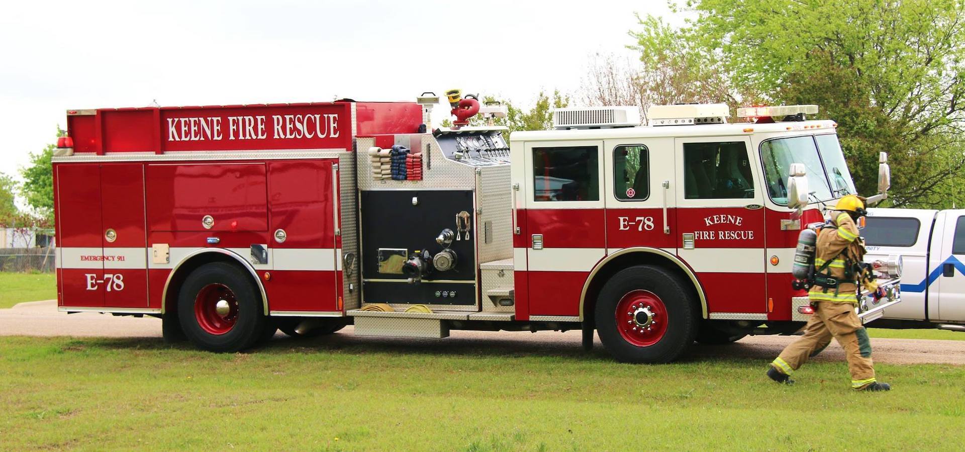 Keene Fire Rescue fire truck parked in a field
