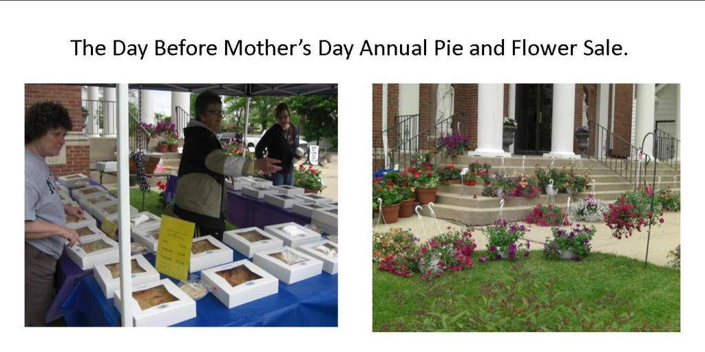Mother’s Day pie and flower sale on a porch, with baked goods, flowers, and volunteers at tables.