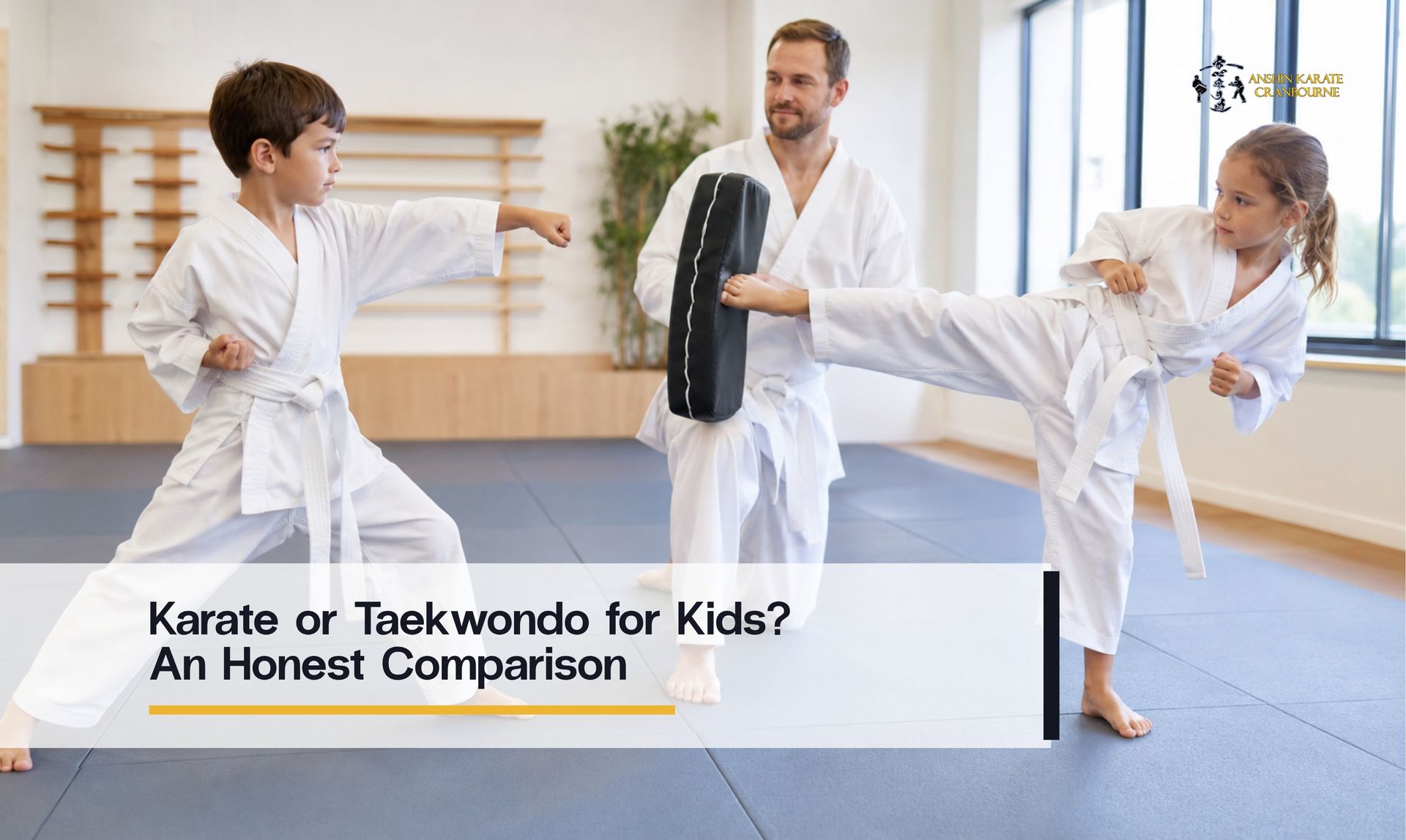 Two children in white martial arts uniforms practise a punch and side kick with an instructor holdin