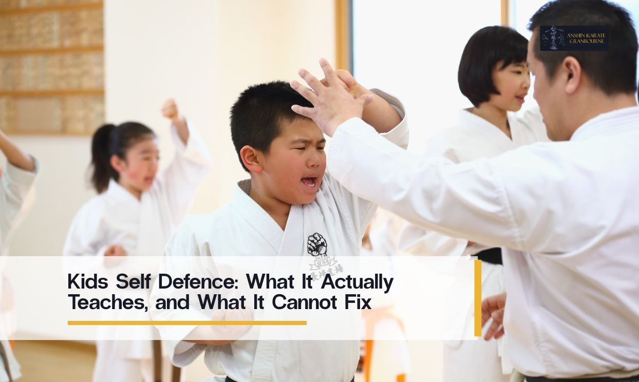 Child practising kids’ self-defence techniques with a karate instructor at Anshin Karate Cranbourne.