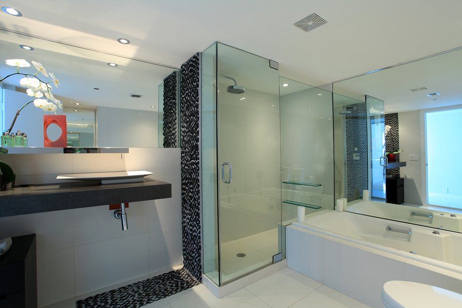 bathroom with bathtub and shower