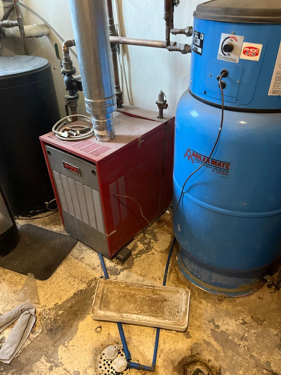 Aging boiler and water heater in a Northern Utah home due for replacement