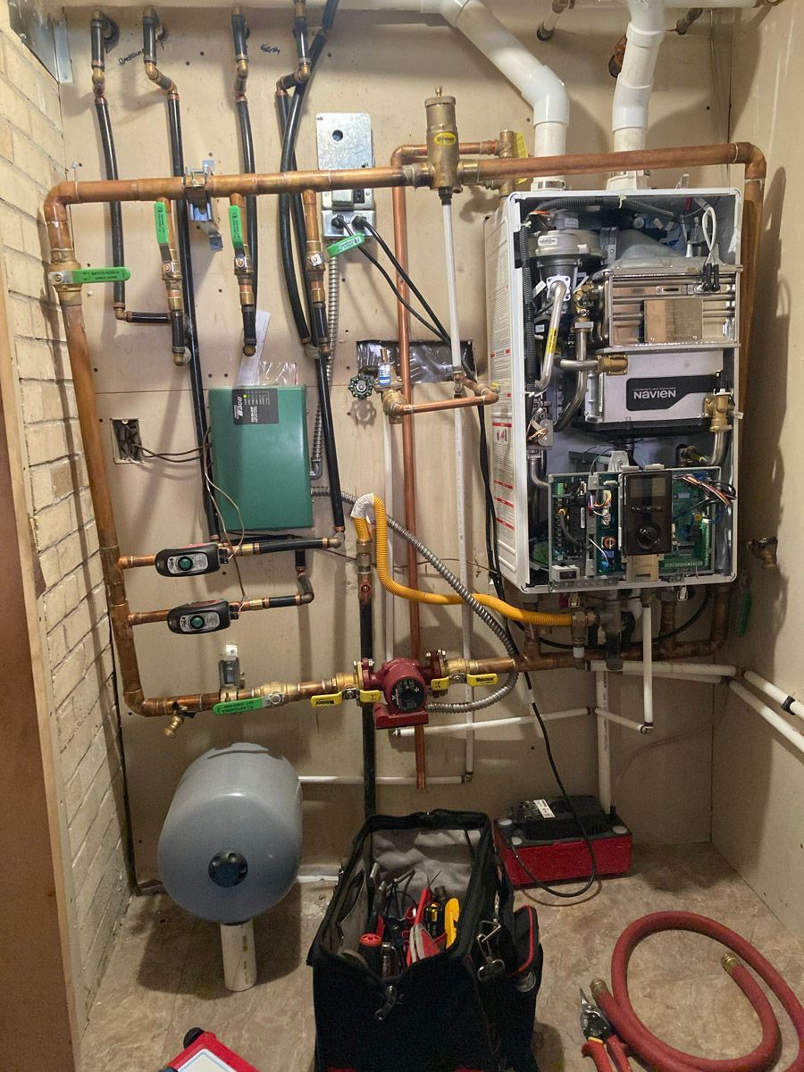 Navien boiler installation with copper piping and gas line connections