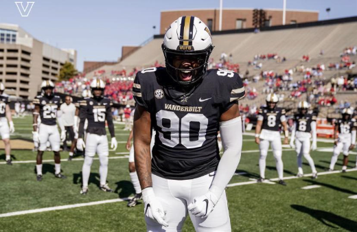 A football player with the number 80 on his jersey