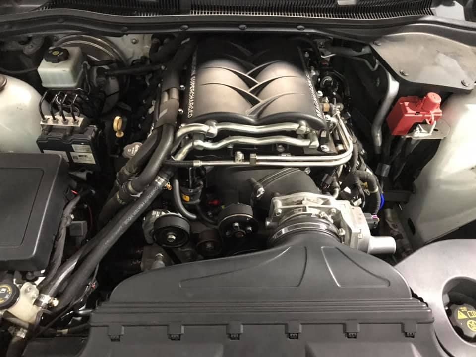 A Close-up Of A Car Engine With The Word Motorsports On It — Mechanic in Lismore, NSW