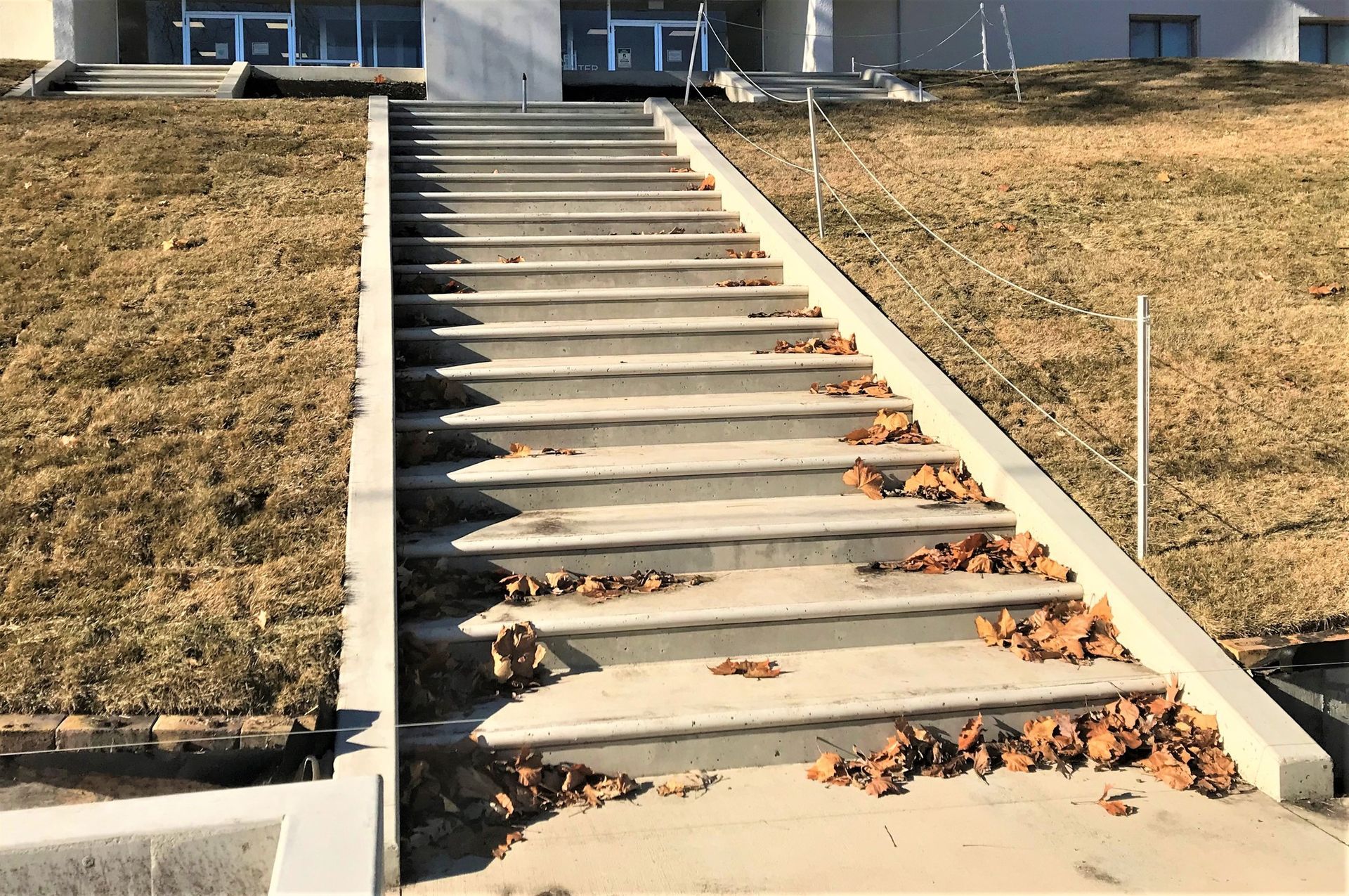 large concrete steps outside of comercial building