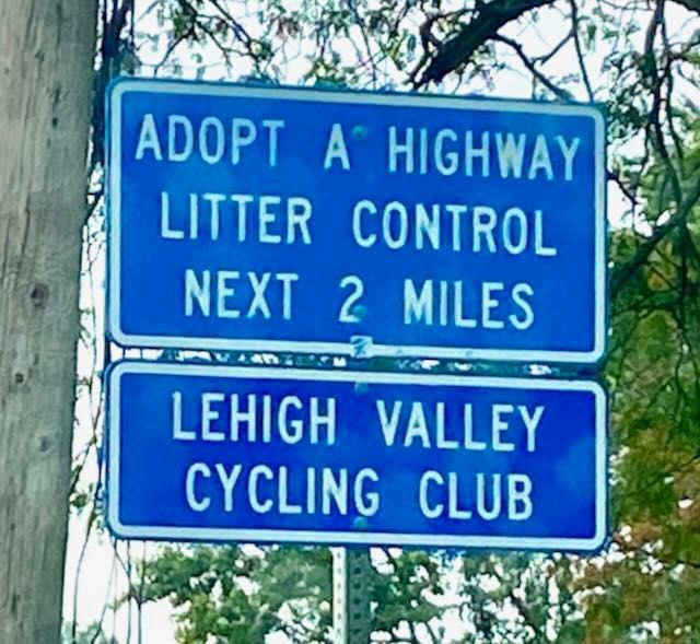 Blue Adopt-A-Highway sign: 