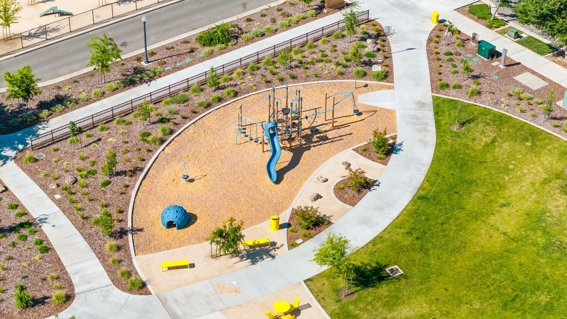 An aerial view of a playground in a park.