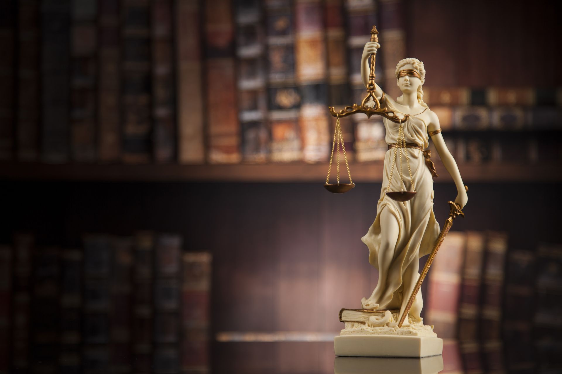 Law theme, mallet of the judge, wooden desk, books - Lawyer in Woy Woy, NSW