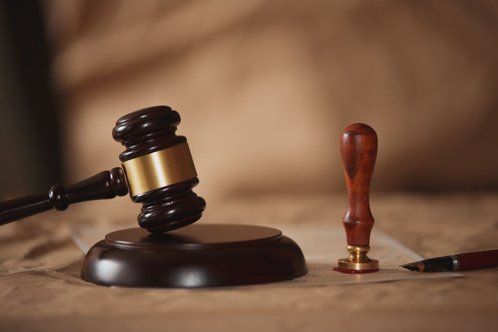 Notary's public pen and stamp on testament and last will. Notary public tools - Lawyer in Woy Woy, NSW
