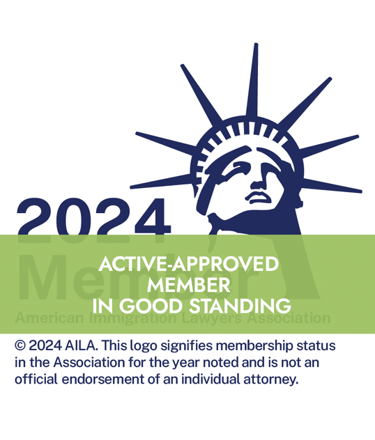 A statue of liberty logo that says 2024 active approved member in good standing