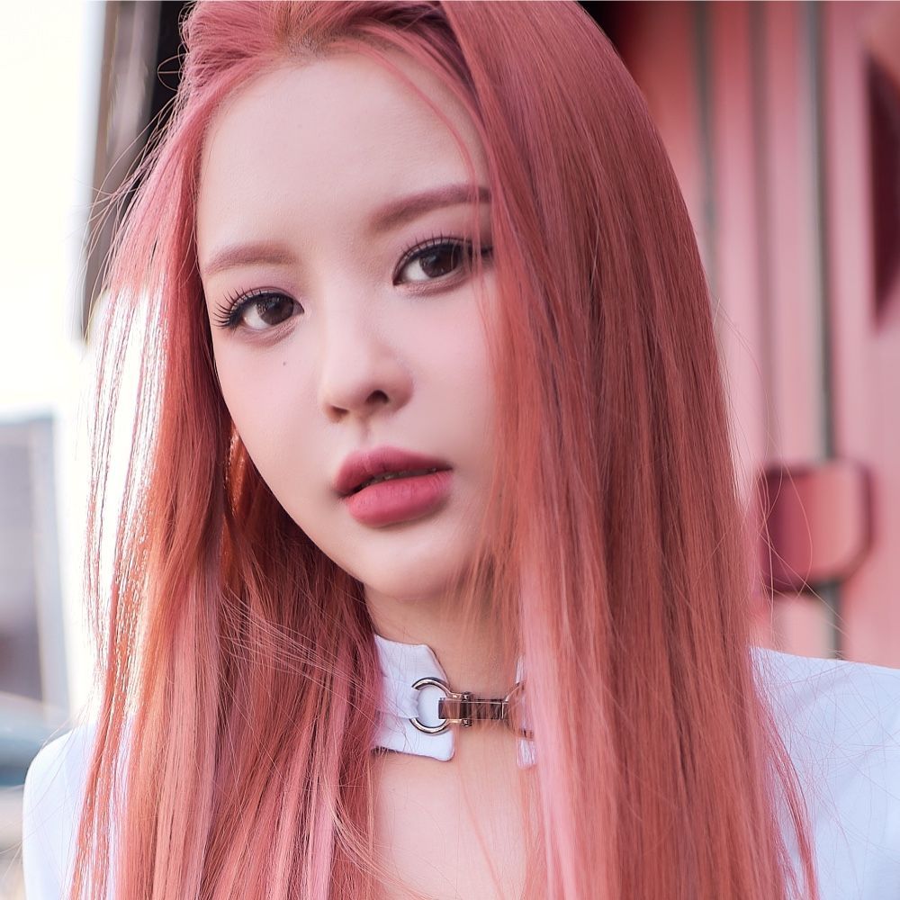Close-up portrait of a person with long pink hair and a white choker, looking at the camera at busan gwangalli haeundae