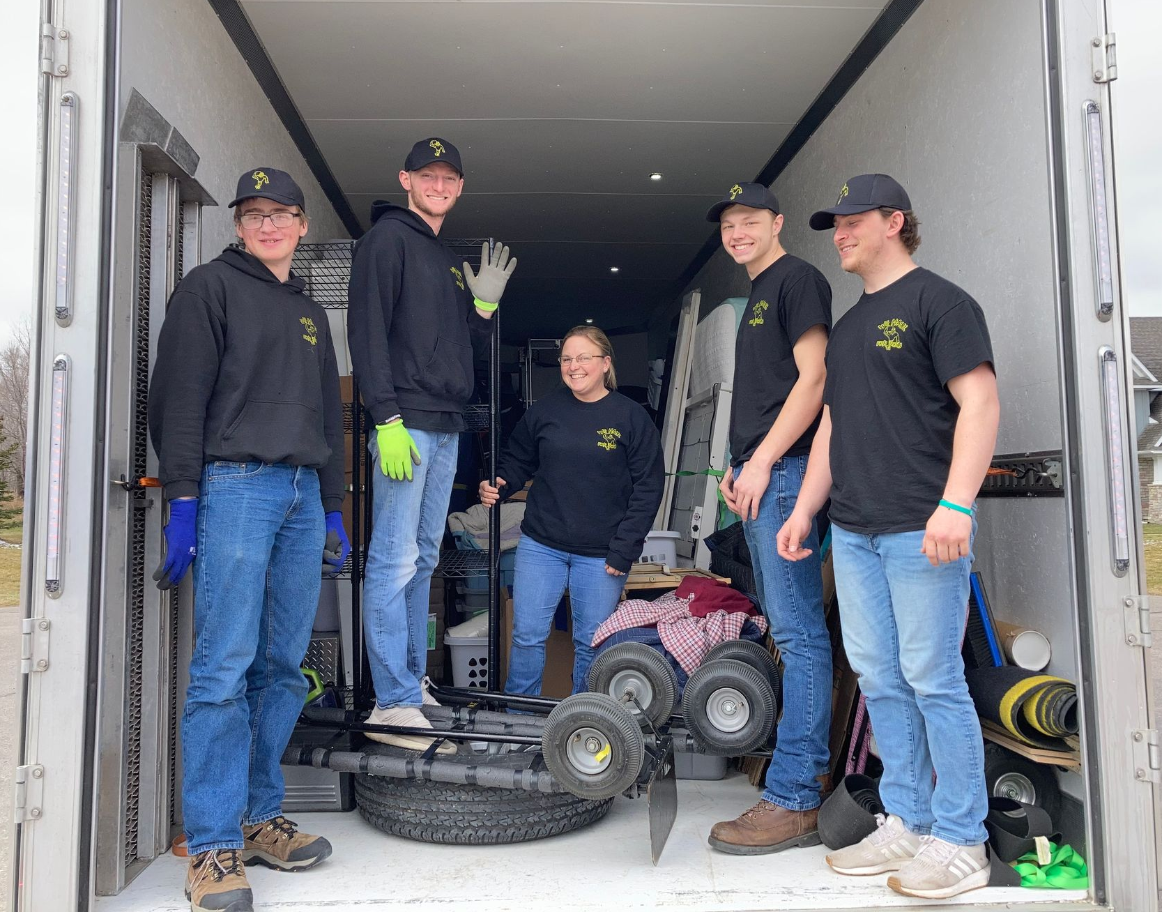 Team members loading truck