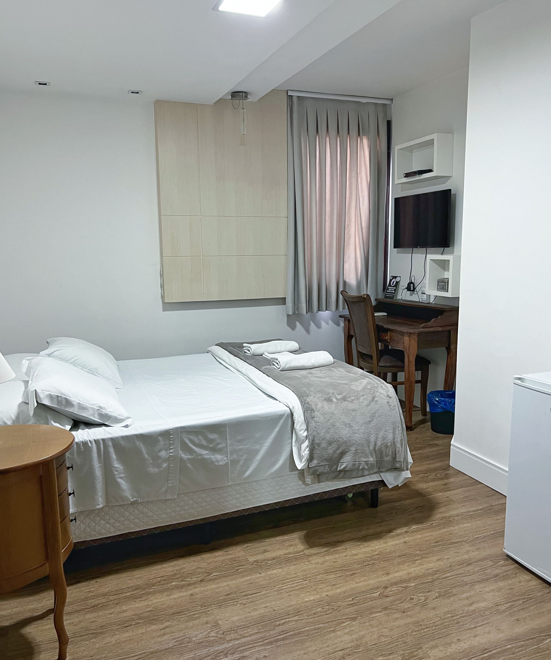There is a large bed in the middle of the room.