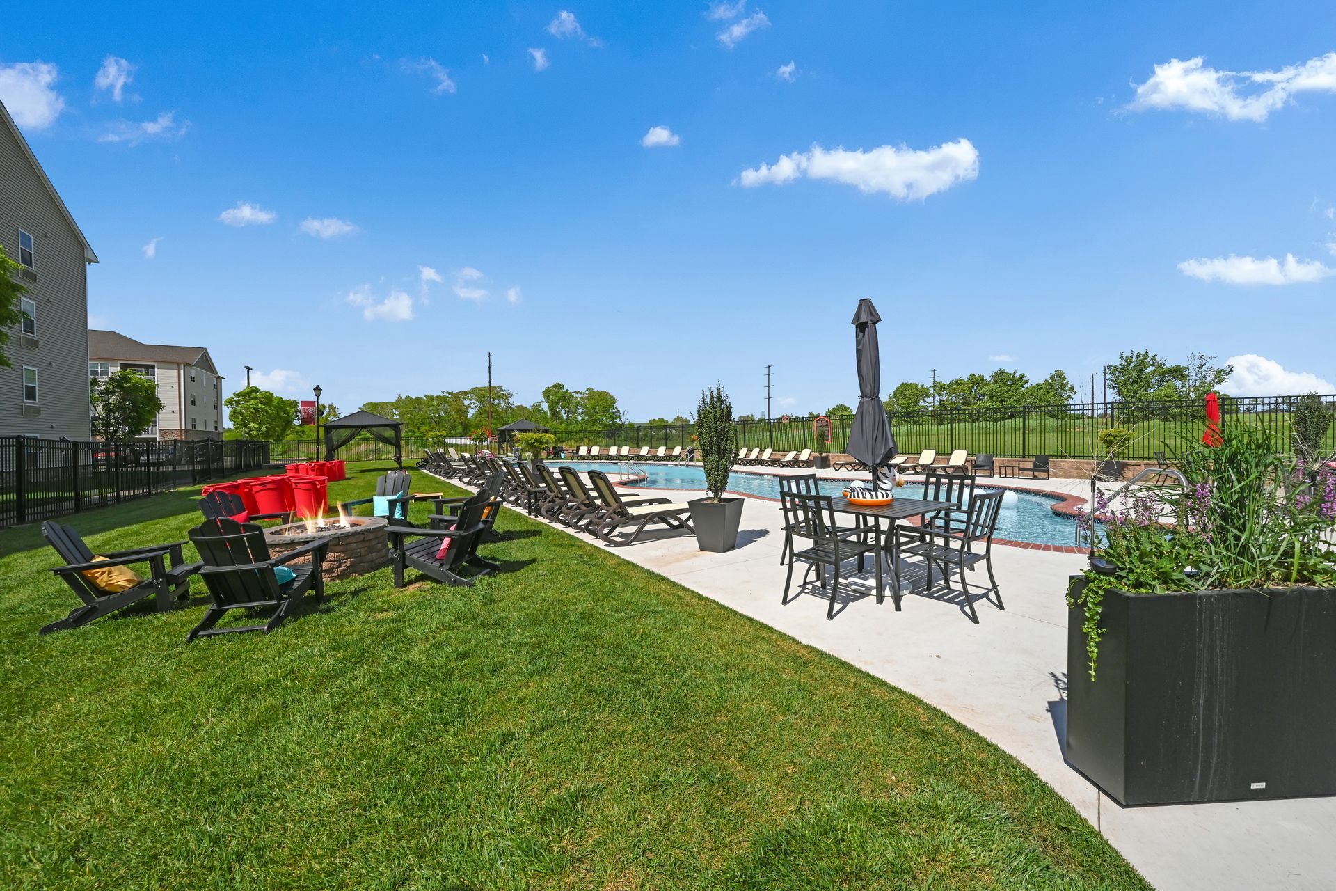 tables by the pool