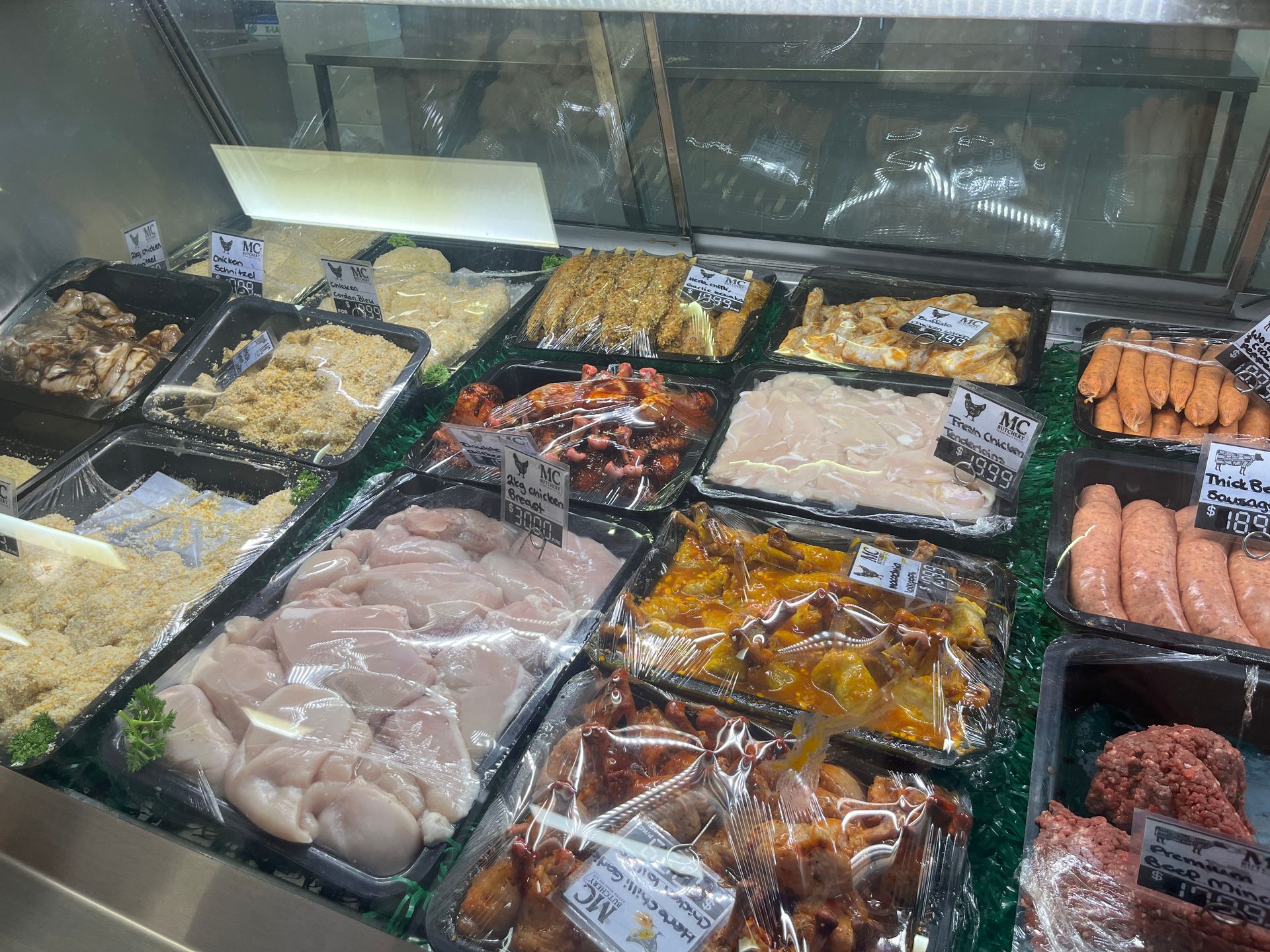 A Tray of Chicken, Sausages, Mushrooms, and Tomatoes — MC Butchery in Moranbah, QLD