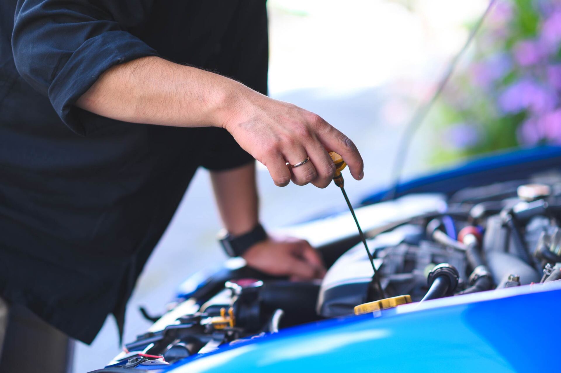 Person checking engine — St. Clairsville, OH — Jeff's Auto Body & Collision Center