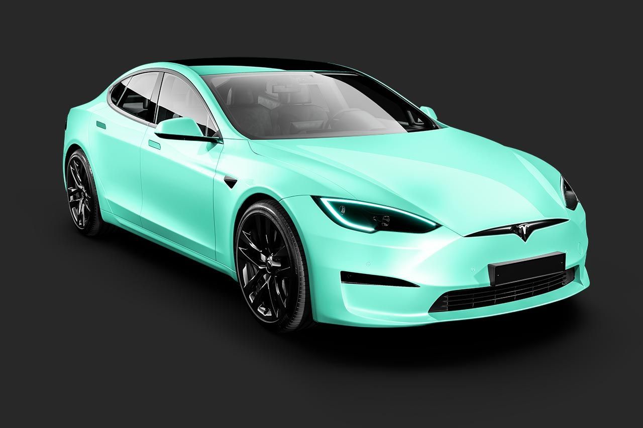 Mint-green Tesla Model S on a dark background, shown in front-left three-quarter view