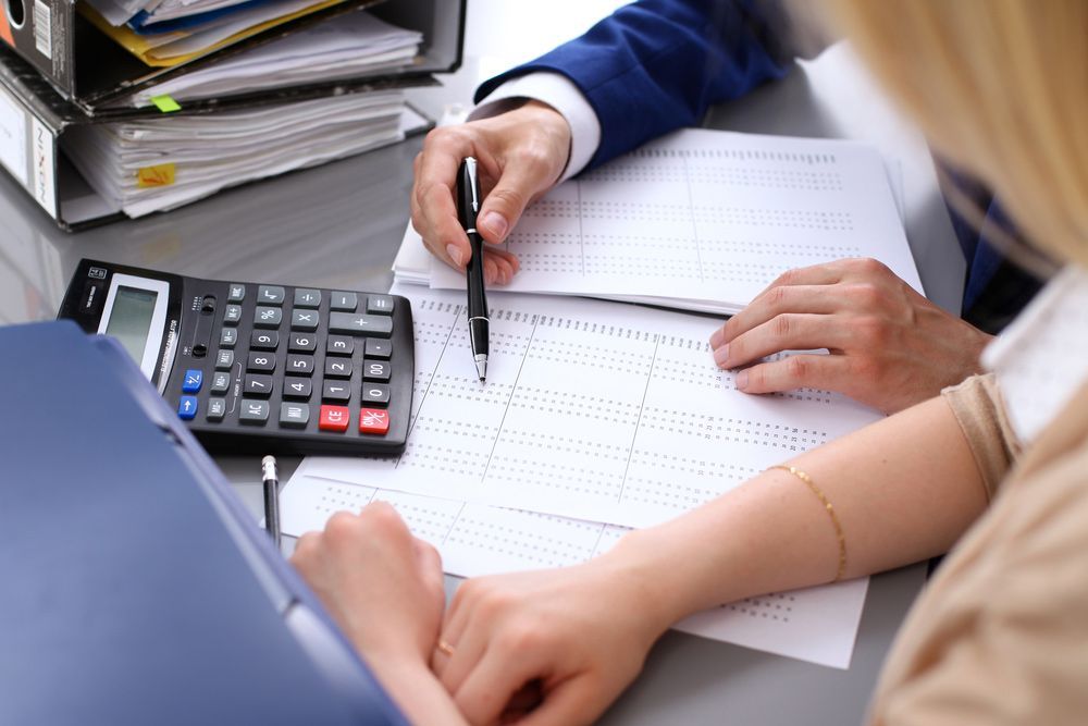 Accountant Explaining Reports — Accounting Services in Coffs Harbour, NSW